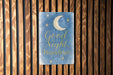 a wooden wall with a sign that says good night wander