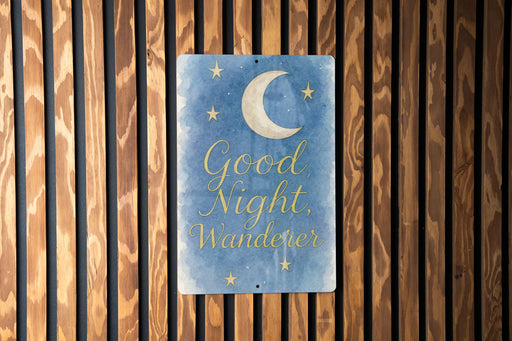 a wooden wall with a sign that says good night wander