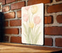 a picture of some flowers on a brick wall