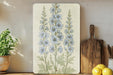 a painting of blue flowers on a white background