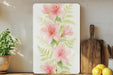 a painting of pink flowers on a white background