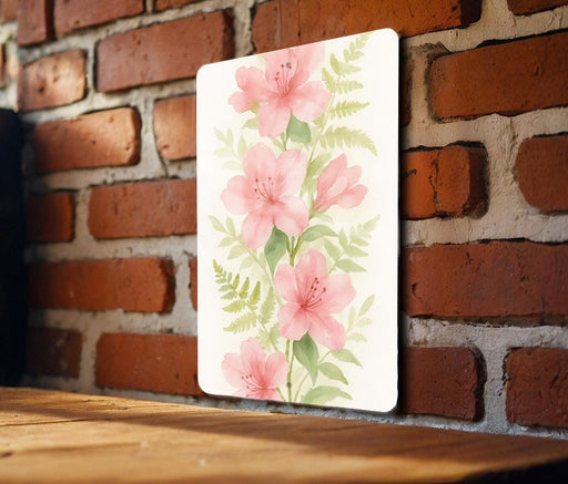 a painting of pink flowers on a white square