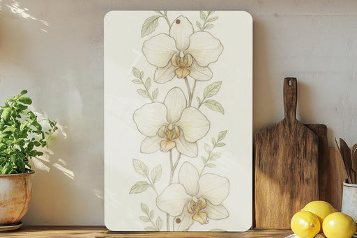 a picture of a flower on a wall next to a cutting board