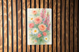 a painting of flowers on a wooden wall
