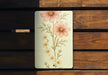 a picture of a flower on a wooden bench