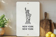 a picture of a statue of liberty on a wall
