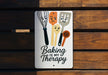 a sign that says baking is my therapy