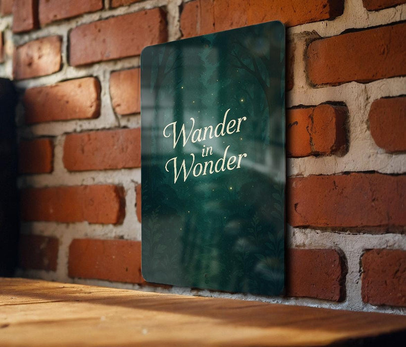 a wooden table sitting next to a brick wall