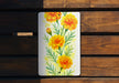 a painting of flowers on a white board