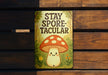 a can of stay spore tacular on a wooden bench