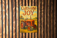 a sign on a wooden fence that says cultivitate joy