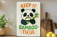 a picture of a panda eating bamboo on a shelf