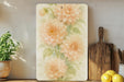 a painting of pink flowers on a white background