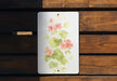 a picture of flowers painted on a white plate