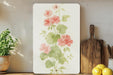 a painting of pink flowers on a white background