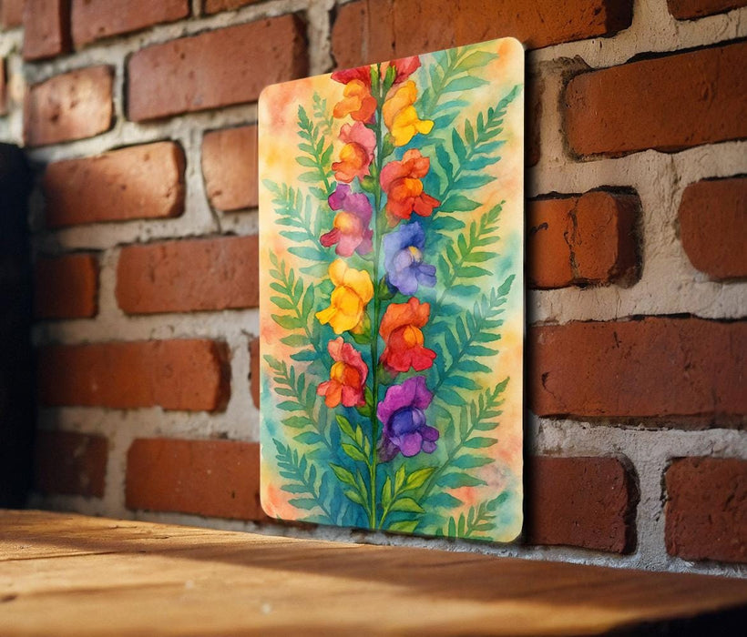 a painting of flowers on a brick wall