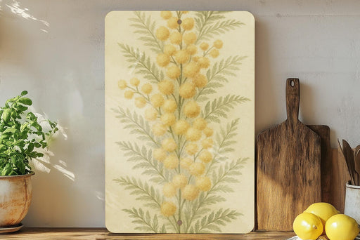 a painting of yellow flowers on a white wall