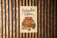 a wooden wall with a sign that says wander often