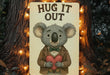 a picture of a koala holding a heart