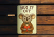 a picture of a koala holding a heart