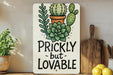 a sign that says prickly but lovable on it