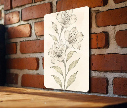 a picture of a flower on a brick wall