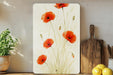 a painting of red flowers on a white background