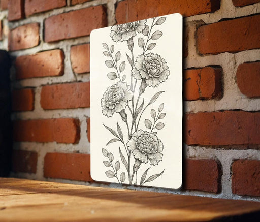 a picture of a flower on a brick wall