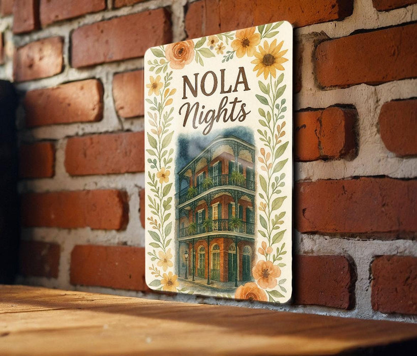 a sign on a brick wall that says nola nights