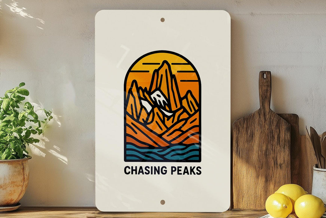 a picture of a mountain range with the words chasing peaks