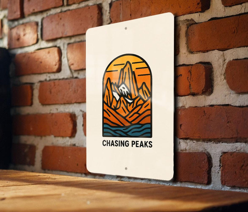 a sign on a brick wall that says chasing peaks