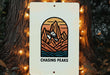 a sign that is hanging on a tree