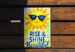 a sign that says rise and shine beautiful