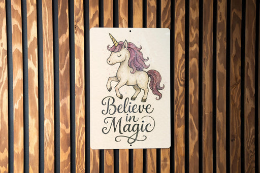 a wooden wall with a sign that says believe in magic