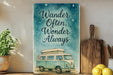 a sign that says wander often, wonder always