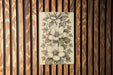 a drawing of flowers on a piece of wood
