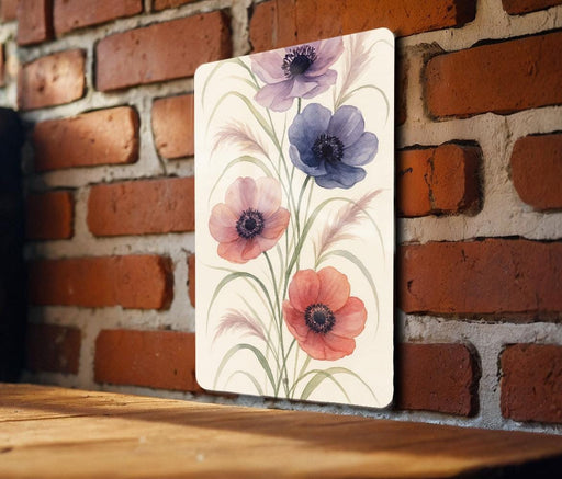 a picture of some flowers on a brick wall