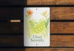 a sign on a wooden bench that says ubud serenity