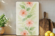 a painting of pink flowers on a white background