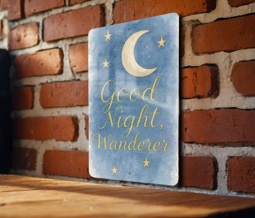 a sign that says good night, wander on a brick wall