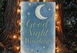 a sign that says good night, wanderr on it