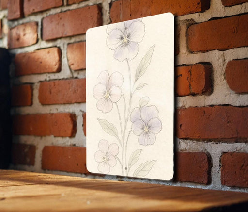 a picture of some flowers on a brick wall
