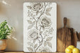 a picture of some flowers on a shelf