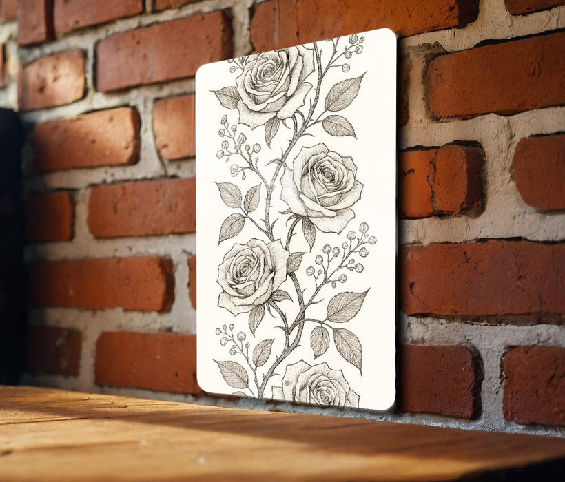a picture of a rose on a brick wall