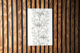 a piece of paper with a drawing of flowers on it