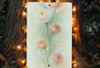 a picture of a painting of flowers on a tree