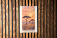 a painting of a tree with a sunset in the background
