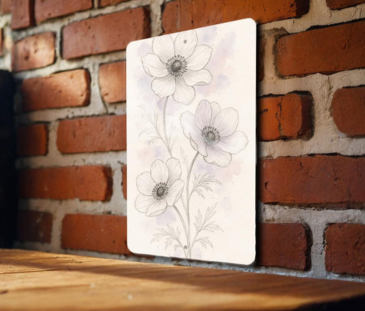 a picture of some flowers on a brick wall