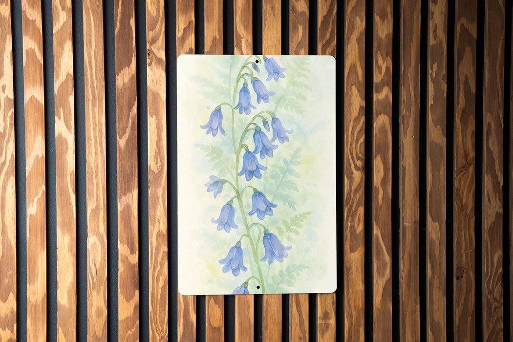 a painting of blue flowers on a wooden wall