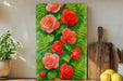 a painting of red flowers on a green background